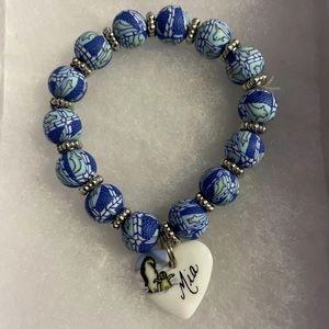 Personalized bracelet “Mia” porcelain heart with penguins, ocean theme beads